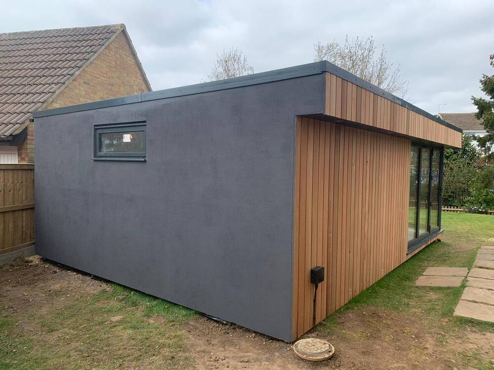 SIP garden room interior with large glazed doors and natural light