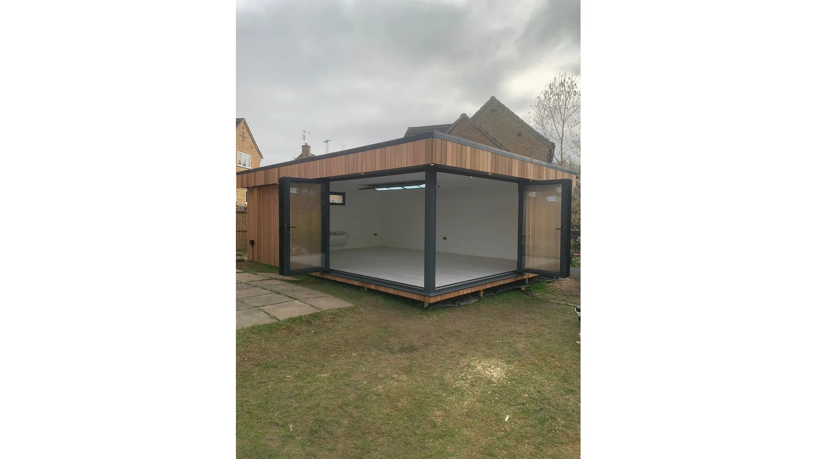 modern garden office Surrey corner glazing cedar cladding SIP construction built by Helps and Co